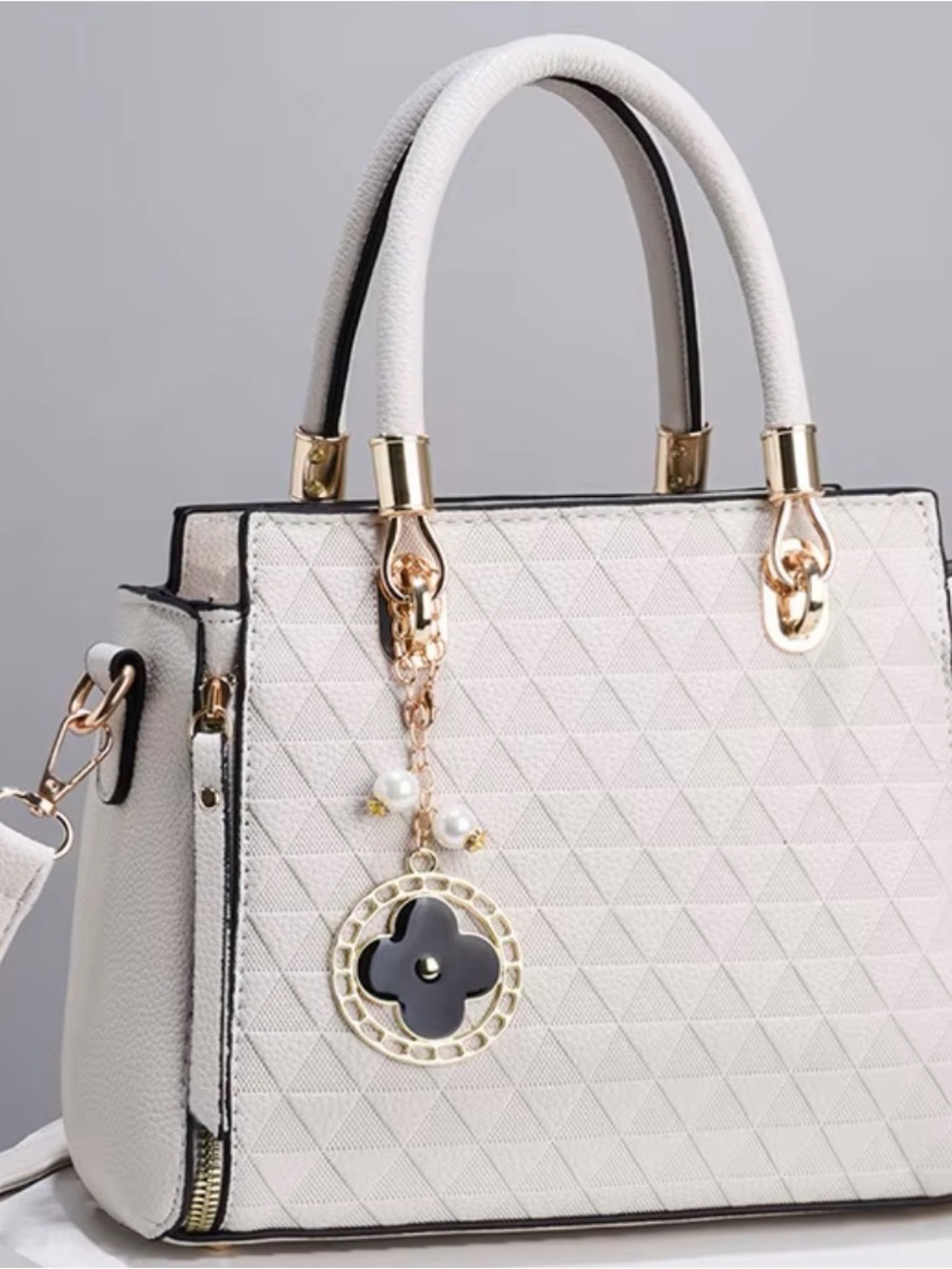 Structured White Quilted Satchel with Gold Hardware and Charm